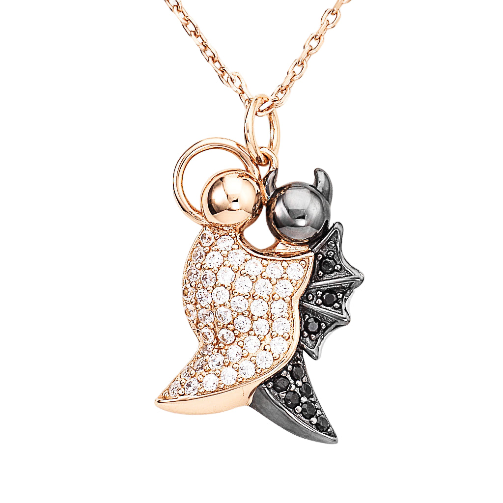 925 sterling silver angel and devil pendant with pavé-set white and black zirconia, gold and gunmetal plating, suspended on a delicate chain | 925纯银天使与恶魔吊坠,密钉镶嵌白色与黑色锆石,金色与枪色镀层,搭配精致链条